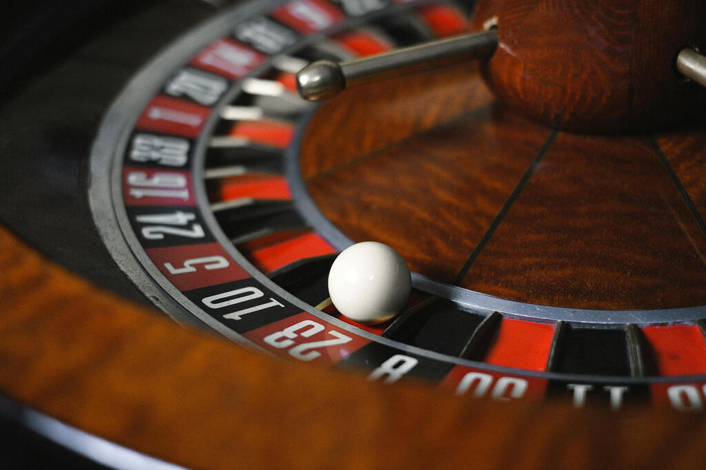 Roulette wheel background with blue overlay